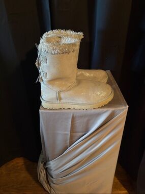 UGG Cream Shearling Winter Boots with Back Bow Detail